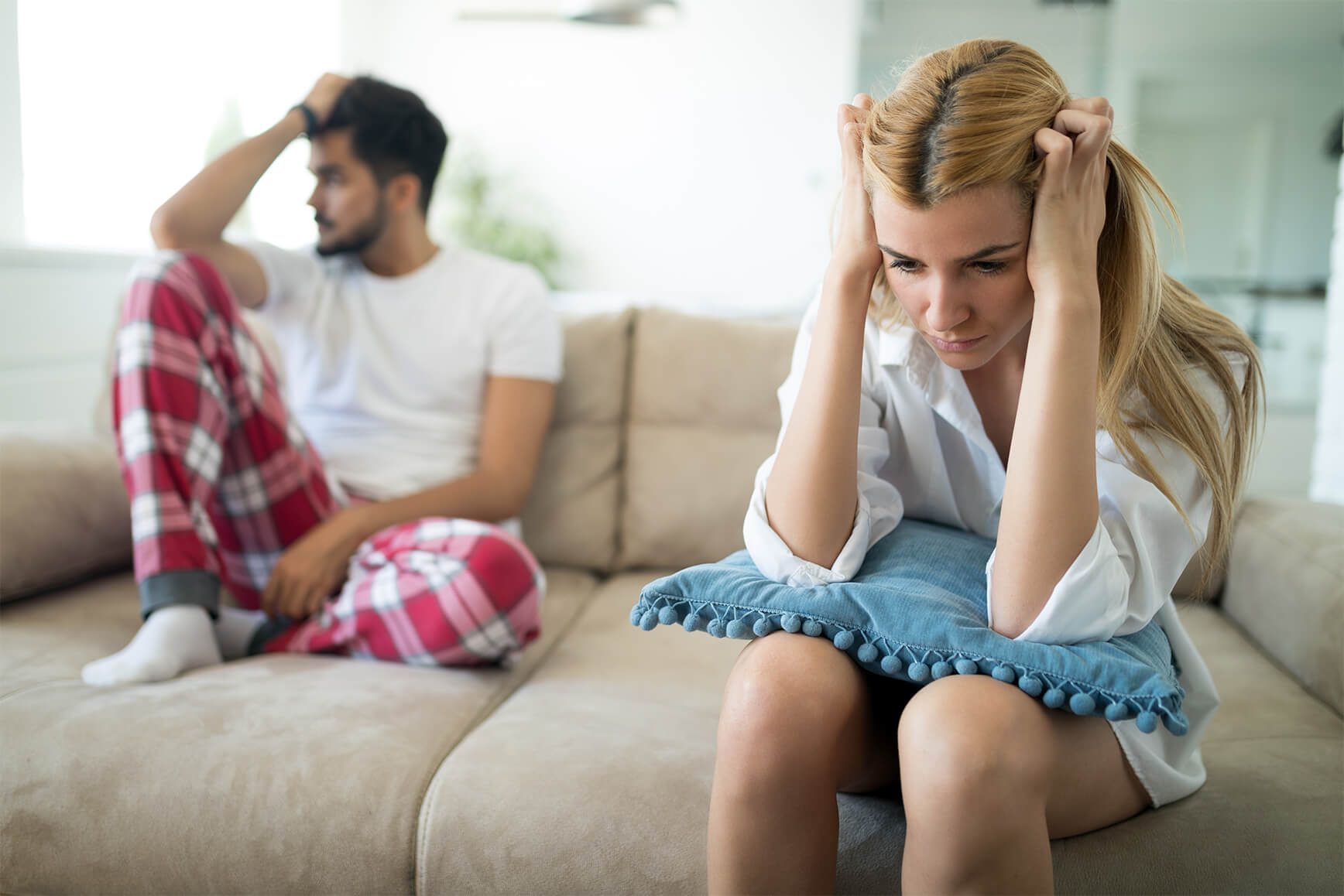 Frustrated couple experiencing 'separation under one roof'